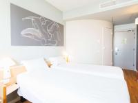 Cama o camas de una habitación en Ibis Elche