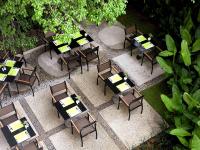 an overhead view of a restaurant with tables and chairs at Ibis Phuket Patong in Patong Beach