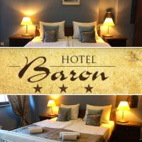 Łóżko lub łóżka w pokoju w obiekcie Baron Boutique Hotel