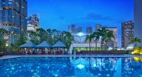 an image of a pool with a city skyline at night at PARKROYAL COLLECTION Marina Bay, Singapore in Singapore