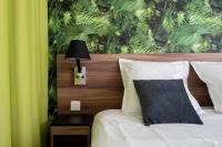 ATHOME RESIDENCE ET SPAにあるベッド
