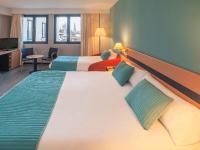 Postel nebo postele na pokoji v ubytování Ibis Styles Zaragoza Ramiro I