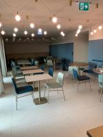 A seating area at HT Hotel Trieste