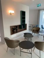 A seating area at HT Hotel Trieste