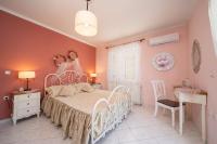 Posteľ alebo postele v izbe v ubytovaní FAIDRA SUPERB SEA VIEW APARTMENT IN ARGOSTOLI