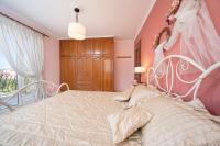 Posteľ alebo postele v izbe v ubytovaní FAIDRA SUPERB SEA VIEW APARTMENT IN ARGOSTOLI