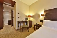 Postel nebo postele na pokoji v ubytování Best Western Hotel Piemontese