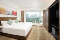 广州友和酒店Yuwa Hotel-Free Shuttle Bus to Canton Fair Complex DuringCanton Fair Periodにあるベッド