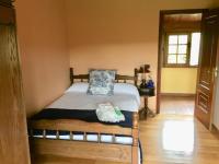 A bed or beds in a room at Casa Ferreiro - Campo da Cruz - Lugo