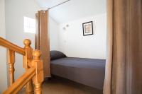 Posteľ alebo postele v izbe v ubytovaní 3 Bedroom Beach House with private sea access