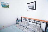 Posteľ alebo postele v izbe v ubytovaní 3 Bedroom Beach House with private sea access