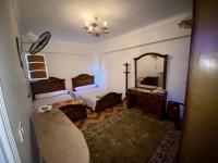 Postel nebo postele na pokoji v ubytování Seaside Two-Bedroom Chalet Sidi Krir