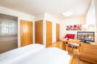 Televízia a/alebo spoločenská miestnosť v ubytovaní MAYER - Wirtshaus und Dorfhotel
