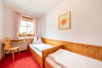 Posteľ alebo postele v izbe v ubytovaní MAYER - Wirtshaus und Dorfhotel