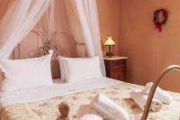 Postel nebo postele na pokoji v ubytování Mounty Island Villas-Nefeli