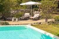 Bazén v ubytování Mounty Island Villas-Nefeli nebo v jeho okolí
