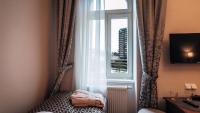 Postel nebo postele na pokoji v ubytování Star Hotel