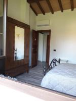 Posteľ alebo postele v izbe v ubytovaní Agriturismo Le Chiare Stelle