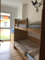 Łóżko lub łóżka w pokoju w obiekcie Appartement Lago Blu