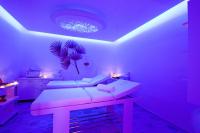 A bed or beds in a room at Villa Le Zagare Relais & SPA