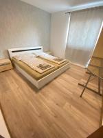 Postel nebo postele na pokoji v ubytování city apartment