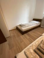 Postel nebo postele na pokoji v ubytování city apartment