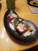 a plate of food on top of a table at Ampervilla Hotel in Fahrenzhausen