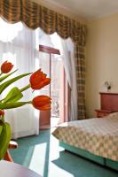 Postel nebo postele na pokoji v ubytování Spa hotel Čajkovskij