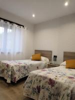 Postel nebo postele na pokoji v ubytování Casa Rural Costalisa