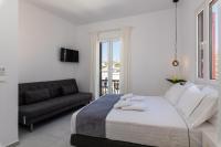 Posteľ alebo postele v izbe v ubytovaní Sunset Paraportiani Rooms