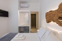 Posteľ alebo postele v izbe v ubytovaní Sunset Paraportiani Rooms
