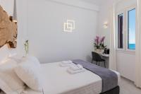 Posteľ alebo postele v izbe v ubytovaní Sunset Paraportiani Rooms