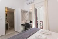 Posteľ alebo postele v izbe v ubytovaní Sunset Paraportiani Rooms