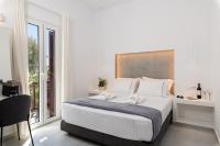 Posteľ alebo postele v izbe v ubytovaní Sunset Paraportiani Rooms
