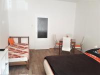 Postel nebo postele na pokoji v ubytování Apartmány Karlštejn
