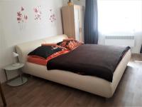 Postel nebo postele na pokoji v ubytování Apartmány Karlštejn