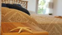 Posteľ alebo postele v izbe v ubytovaní Montilisciu Cottage