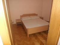 Postel nebo postele na pokoji v ubytování Apartments Golubić