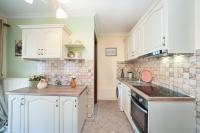 Kuchyňa alebo kuchynka v ubytovaní AIGLI ELEGANT SEA VIEW APARTMENT IN ARGOSTOLI