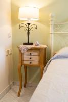 Posteľ alebo postele v izbe v ubytovaní AIGLI ELEGANT SEA VIEW APARTMENT IN ARGOSTOLI