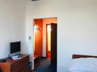 Postel nebo postele na pokoji v ubytování Hotel Nostalgia