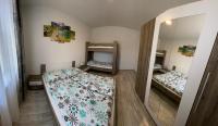 Posteľ alebo postele v izbe v ubytovaní Apartmán Pod Klinom
