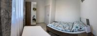 Posteľ alebo postele v izbe v ubytovaní Apartmán Pod Klinom