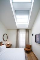 Posteľ alebo postele v izbe v ubytovaní Hotel Arbaso