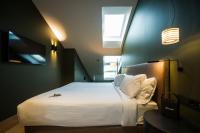 Posteľ alebo postele v izbe v ubytovaní Hotel Arbaso
