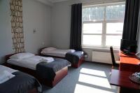 Łóżko lub łóżka w pokoju w obiekcie Hotel Centrum