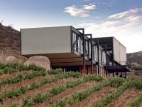 a house on top of a hill with plants at Encuentro Guadalupe in Valle de Guadalupe