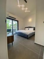 Ein Bett oder Betten in einem Zimmer der Unterkunft Top Royal Eilat רויאל פארק