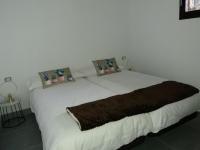 A bed or beds in a room at Bungalowmirador