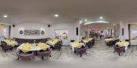 A restaurant or other place to eat at Pension & Restaurant La Amalia